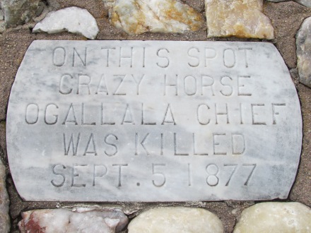 Stone monument at the site of the murder of Crazy Horse